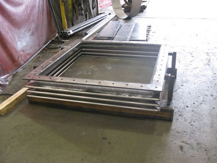 Single rectangular stainless steel expansion joint with mitered corners 